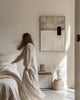 Framed canvas wall art collection in a modern bedroom - The House Outfit