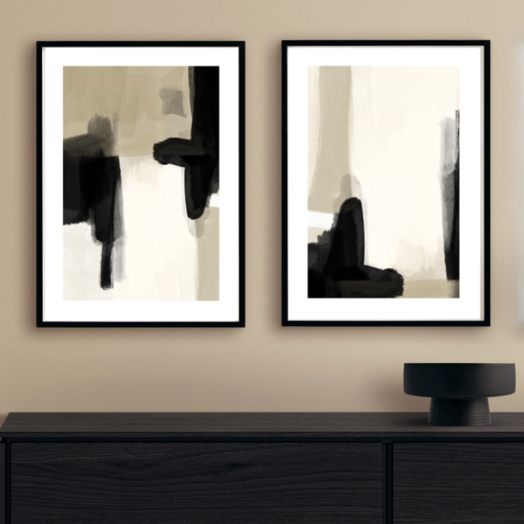 A black frame with an abstract print 