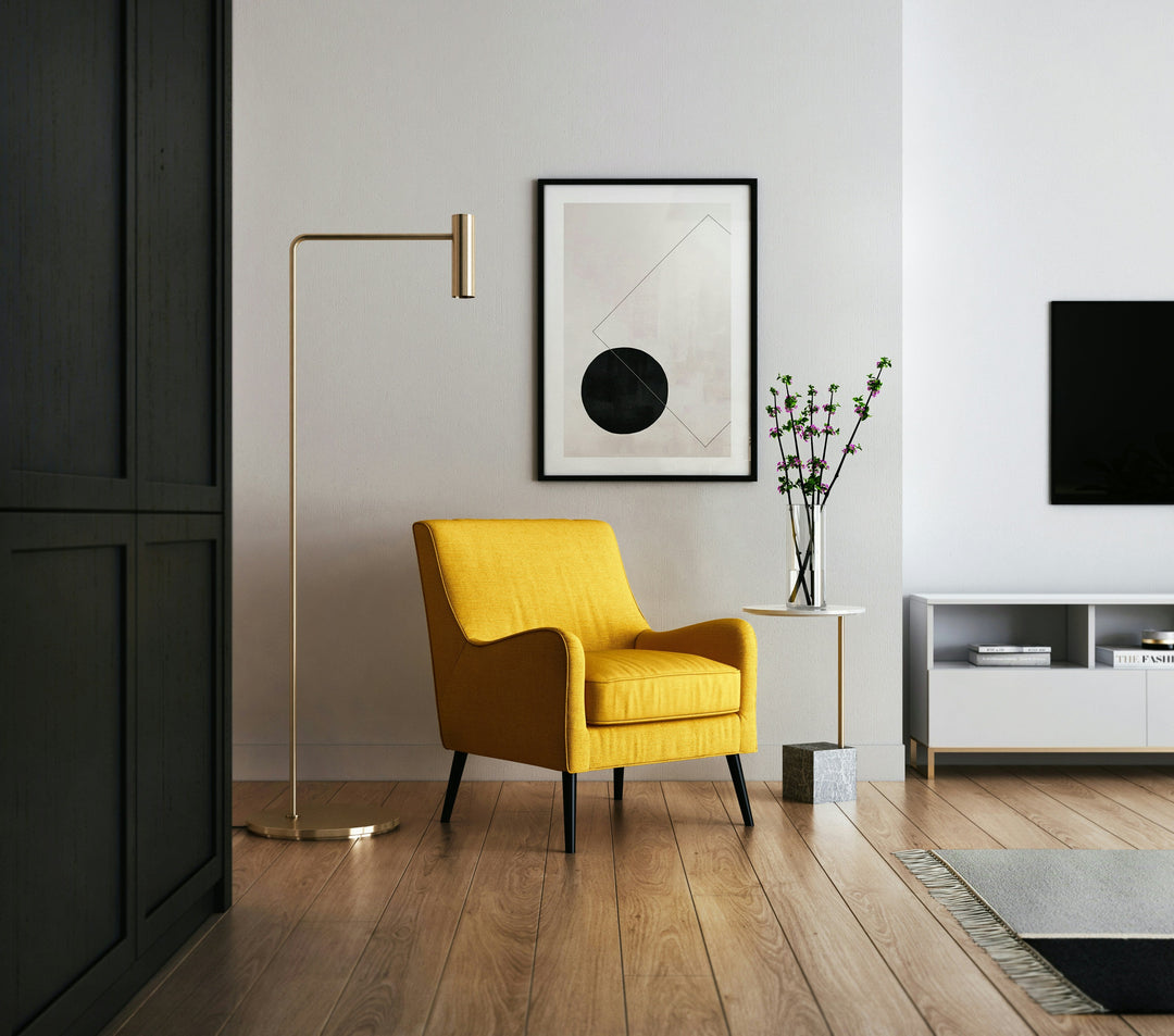 yellow chair in the middle of modern livingroom