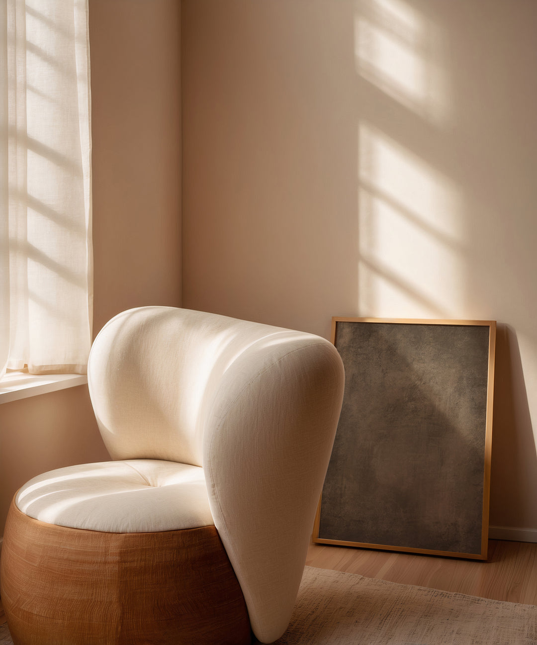 Modern white chair with wooden base in a room with a framed brown wall art print in modern stylish neutral oak wood frame on the wall.