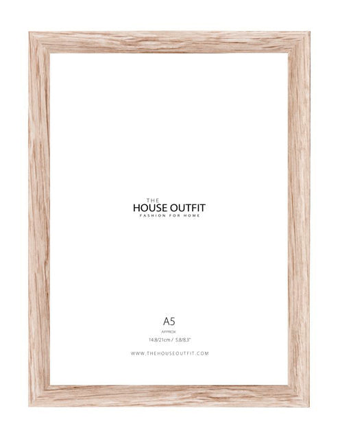 A light natural wood picture frame with an A5 size white mat board, shown on a solid white background. The mat features printed text for 'THE HOUSE OUTFIT'.