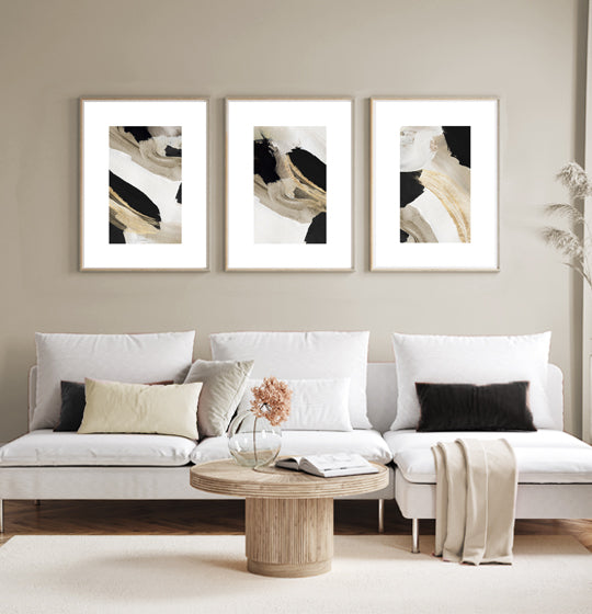 Beige gold and black abstract framed gallery wall 